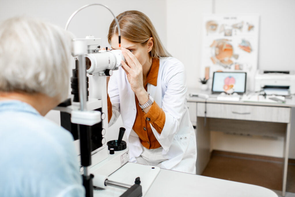 ophthalmologist examining eyes with a microscope 2021 09 24 15 23 47 utc