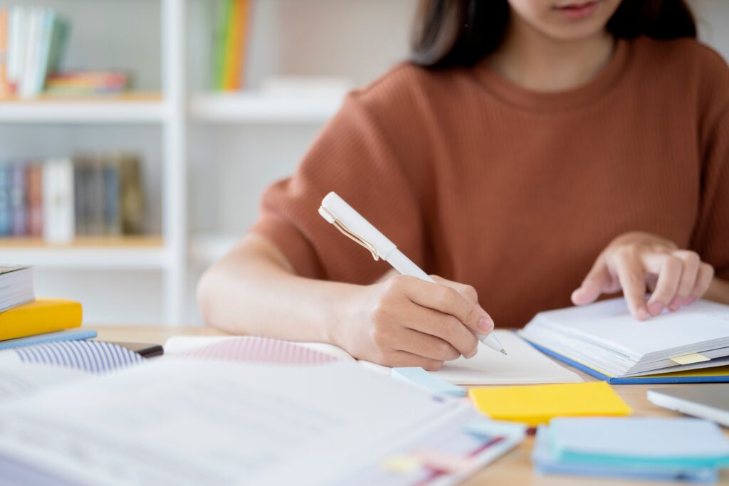 young student woman with lots of books studying fo 2021 09 05 18 25 59 utc